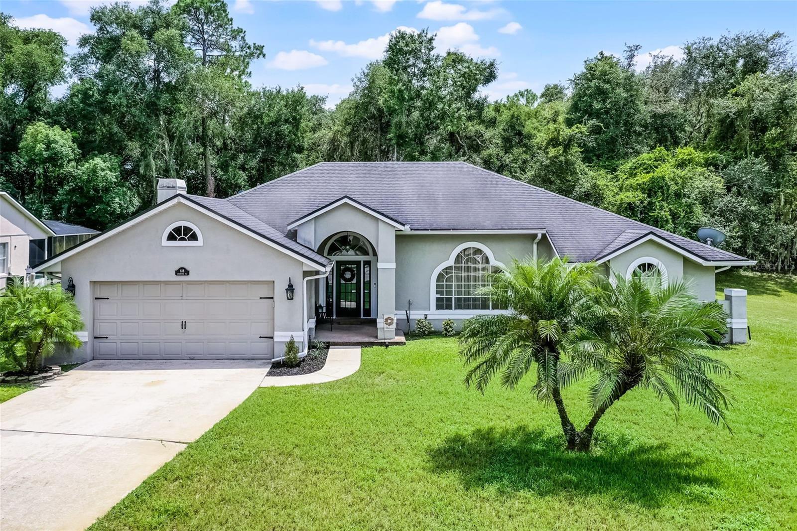 **LOCATION -- LOCATION** **NO REAR OR SIDE NEIGHBORS -- CONSERVATION LOT OVER 1/4 ACRE** **BRING YOUR BOAT & WATER TOYS -- DEEDED LAKE ACCESS & COMMUNITY BOAT RAMP** **FOUR BEDROOMS -- ALL ON ONE LEVEL** **PRIVATE SCREENED POOL + LARGE FULLY FENCED YARD** **WOOD FLOORING** **NEWER HVAC 2024 & WATER HEATER 2022** Welcome to this beautiful move-in ready home in the highly coveted Lake Sylvan Cove neighborhood! This very special premium lot located on a dead-end cul-de-sac measures over 1/4 acre in size with no side neighbor and NO REAR NEIGHBORS backing completely to conservation and the beautiful Sylvan Lake Park. Bring your boat & water toys -- enjoy DEEDED LAKE ACCESS & COMMUNITY BOAT RAMP to Sylvan Lake -- make your fishing, boating, kayaking dreams a reality. LOCATION -- LOCATION. This home & beautiful community is tucked away amongst quiet neighborhoods and horse farms, yet enjoys incredibly convenient & easy access to anywhere in Central Florida from the expanded Wekiva Parkway (429) -- with highway entry just less than two (2!) miles from your door. You will also be sure to enjoy the Sylvan Lake Park, located directly behind this home on Lake Markham Road, which boasts tennis courts & USTA-certified professionals, six soccer fields (find pros from the Orlando Pride training here regularly!), four racquetball courts, picnic areas, playgrounds, fishing & trails. Starting with great curb appeal, this home welcomes with a long driveway for ample parking space & a spacious front entry. This fantastic & flexible floorplan features FOUR bedrooms and TWO FULL bathrooms (including pool access!) -- all on ONE level. TONS of natural light throughout with vaulted ceilings, double sky lights in kitchen area and THREE (3!) sets of sliding doors all opening onto the large screened patio and pool. Beautiful WOOD FLOORING throughout living areas. Cozy wood burning fireplace in the large family room. Live the FLORIDA LIFE outdoors in this oasis of privacy & peace -- fully fenced large yard including expansive side yard, private screened pool with plenty of patio space, child safety fence, outdoor shower -- and then escape the sun and heat in your additional large screened and covered lanai sitting space! Whole home reverse osmosis water filtration system -- $10K value. Newer HVAC -- 2024. Water heater -- Nov 2022. Enhanced security system included. THIS -- is one of those special ones. WELCOME HOME.