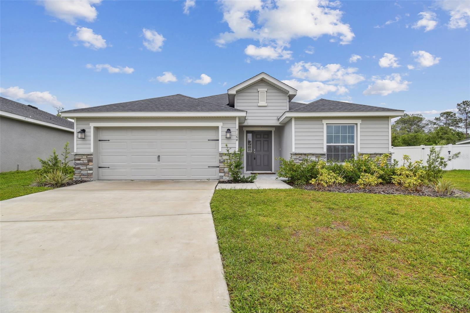 NO PETS!!! This 3 bedroom, 2 bath PLUS office home is nestled in a quiet neighborhood on a oversized pie shaped lot with water and woods view! The inviting floorplan will carry you through the spacious family room to the beautiful open kitchen. Stainless steel appliances, huge island/breakfast bar, and high ceilings are just a few features that make this home immaculate! With an added screened in patio, this house is perfect for entertaining at any time of the year. Both bathrooms contain dual vanities that make it excellent for a growing family! Located incredibly close to shops and local restaurants, it is a great area to be in.