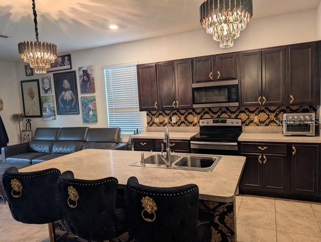 Photo of 301 Feltrim Reserve Boulevard, Davenport, FL 33837 (MLS # S5157047)