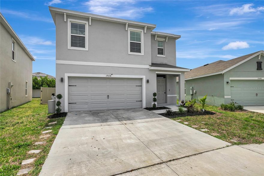 Better than New in Southshore Bay! Over 2,500 square feet and one of the best DR Horton floor plans the Robie. The home boasts 5 bedrooms, 3 full bathrooms, and an open floor plan concept for the living room/dining/kitchen areas. The kitchen is a chef's dream, with a large granite center island perfect for bar-style eating or entertaining, a sizable pantry, and ample cabinets and counter space. The loft area upstairs is a perfect area for an office, game room or play area. The second floor features a split bedroom floor plan with master suite and 3 additional bedrooms, and another full bathroom. The laundry room is conveniently located on the second floor. An additional bedroom is located on the first floor and is perfect for guests. Southshore Bay is an active resort style community, with a 5-acre lagoon! This massive beach resort-style pool offers a range of activities such as paddleboarding, kayaking, and even scuba diving. You can enjoy a water slide, an inflatable obstacle course, sandy beaches, and even a swim-up Tiki bar. The clubhouse has a fitness center, card room, billiard room, indoor/outdoor dining. Your HOA includes Spectrum UltraFi internet and cable.