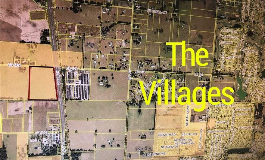 Under contract-accepting backup offers. 29 Acres located near The Villages, Florida. Just 1 mile North of CR 466.  Located at the corner of US Highway 301 and CR 202. Approx 1,318 ft of frontage on US Hwy 301 and approx 850 ft of frontage on CR 202. Great location for Auto Dealership, Hospital, Big Box or Storage. The property is cleared and fenced. Lots of paved road frontage, corner location, median cut and divided Hwy with two lanes each way. Annexed to the City of Wildwood. Zoned C-2. Great location for Mixed Use Development. Possible City Utilities with developers agreement with the City of Wildwood.  Make sure to check out the drone video.