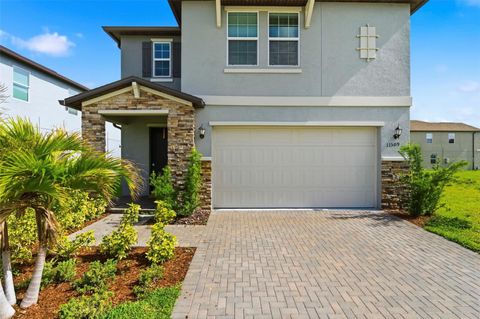 Photo of 11509 72nd Place E, Palmetto, FL 34221 (MLS # TB8495703)