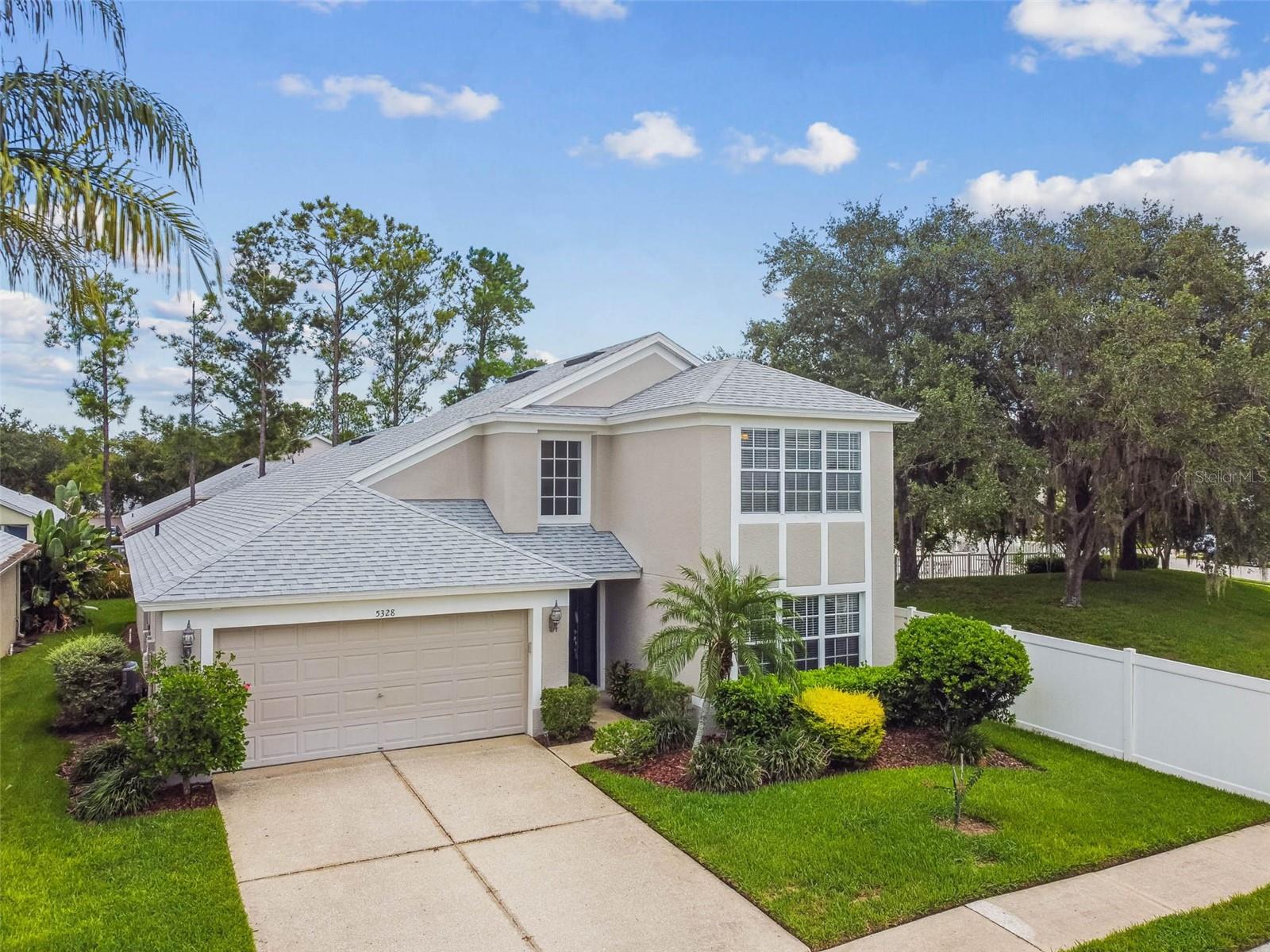 Welcome to your future home in Desired Golf Course community of Lexington Oaks in Wesley Chapel, FL. This charming property offers a prime location, GATED, with easy access to highways, restaurants, shopping, schools, and hospitals. You'll appreciate the Open floor plan, LVP and tile throughout, NO CARPET, 3 bedrooms , OFFICE, 3 full bathrooms, eat-in kitchen, dining, and a laundry room with washer and dryer included. The PRIMARY Bedroom is on the FIRST floor and offers a large walk-n closet, and en suite bath that has been updated with double sinks, shower and soaking tub. The 2nd Bedroom, Office and 2nd Bath are on the first floor. Upstairs you will find the 3rd Bedroom with en suite 3rd Bath. Entertain or enjoy the serenity of the covered, screened patio. Remington Village has its own private pool and you also have access to the Community Center, Pool, Playground, Tennis, Fitness, and public Golf Course. This is a MAINTENANCE FREE single family home in GATED Remington Village and the HOA fee covers the exterior painting, lawn service, gates, and community amenities. ROOF 2021, HVAC 2018. Don't miss the chance to make this property your new home. Contact us today for more information and to schedule a viewing!