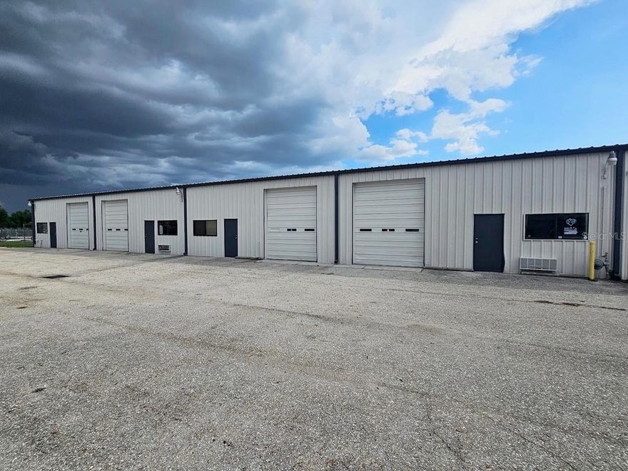 Rent one unit or rent all 4 available spaces.  3 units contain commercial warehouse space, one bathroom, climate controlled office space and large window, overhead door, single door entry at office area and 3+/- parking spaces per unit. Additional unit has no office space otherwise same features. No CAM fee and water is included.