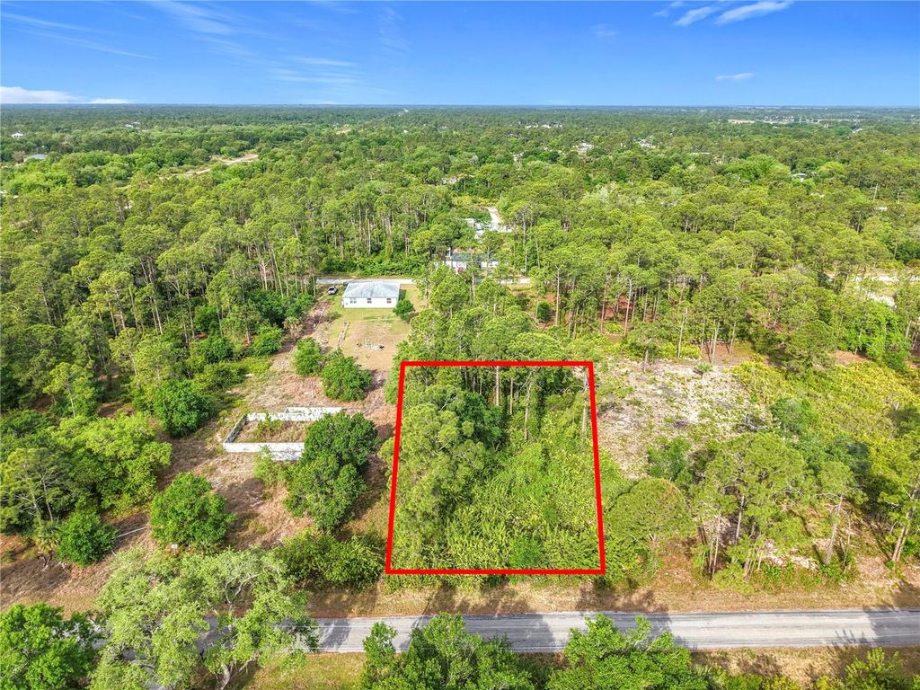 Photo of 1611 8th Avenue, Lehigh Acres, FL 33972 (MLS # O6292594)