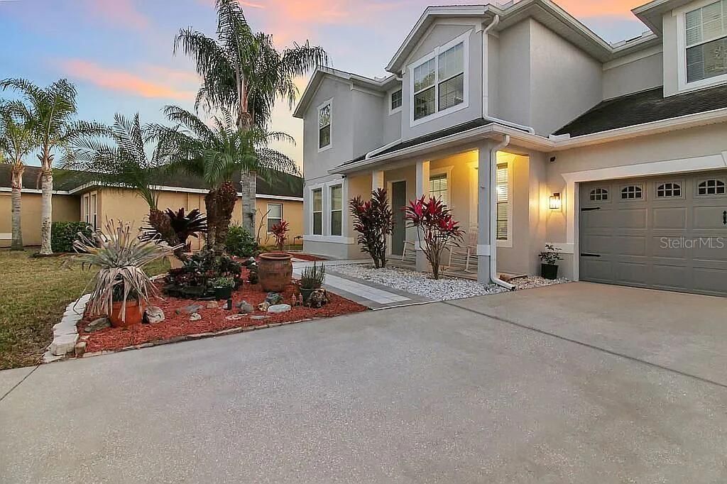 Photo of 2254 Osprey Woods Circle, Orlando, FL 32820 (MLS # O6381889)