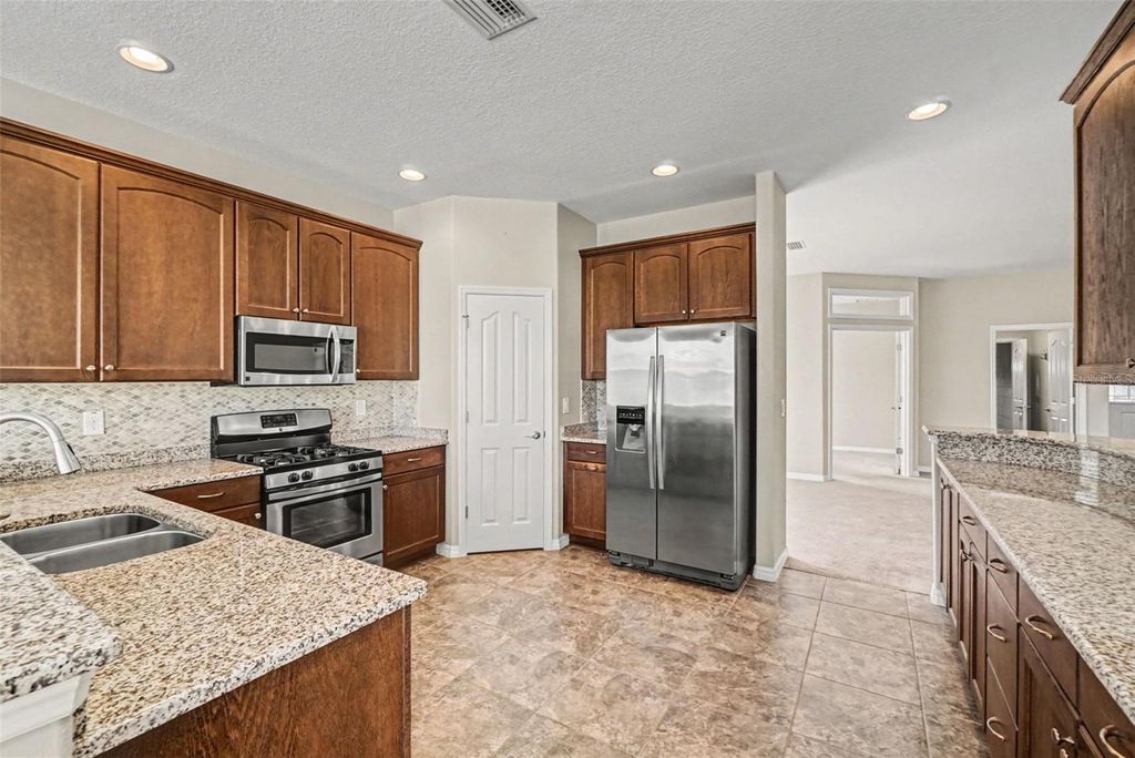 Photo of 27014 Camerons Run, Leesburg, FL 34748 (MLS # O6384954)