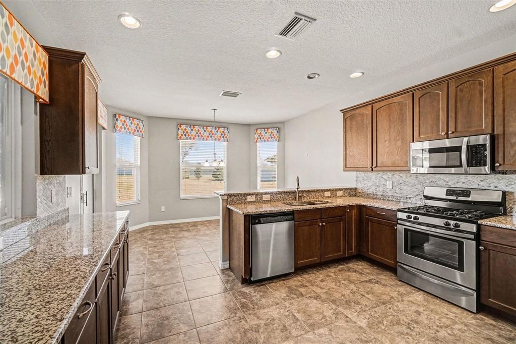 Photo of 27014 Camerons Run, Leesburg, FL 34748 (MLS # O6384954)