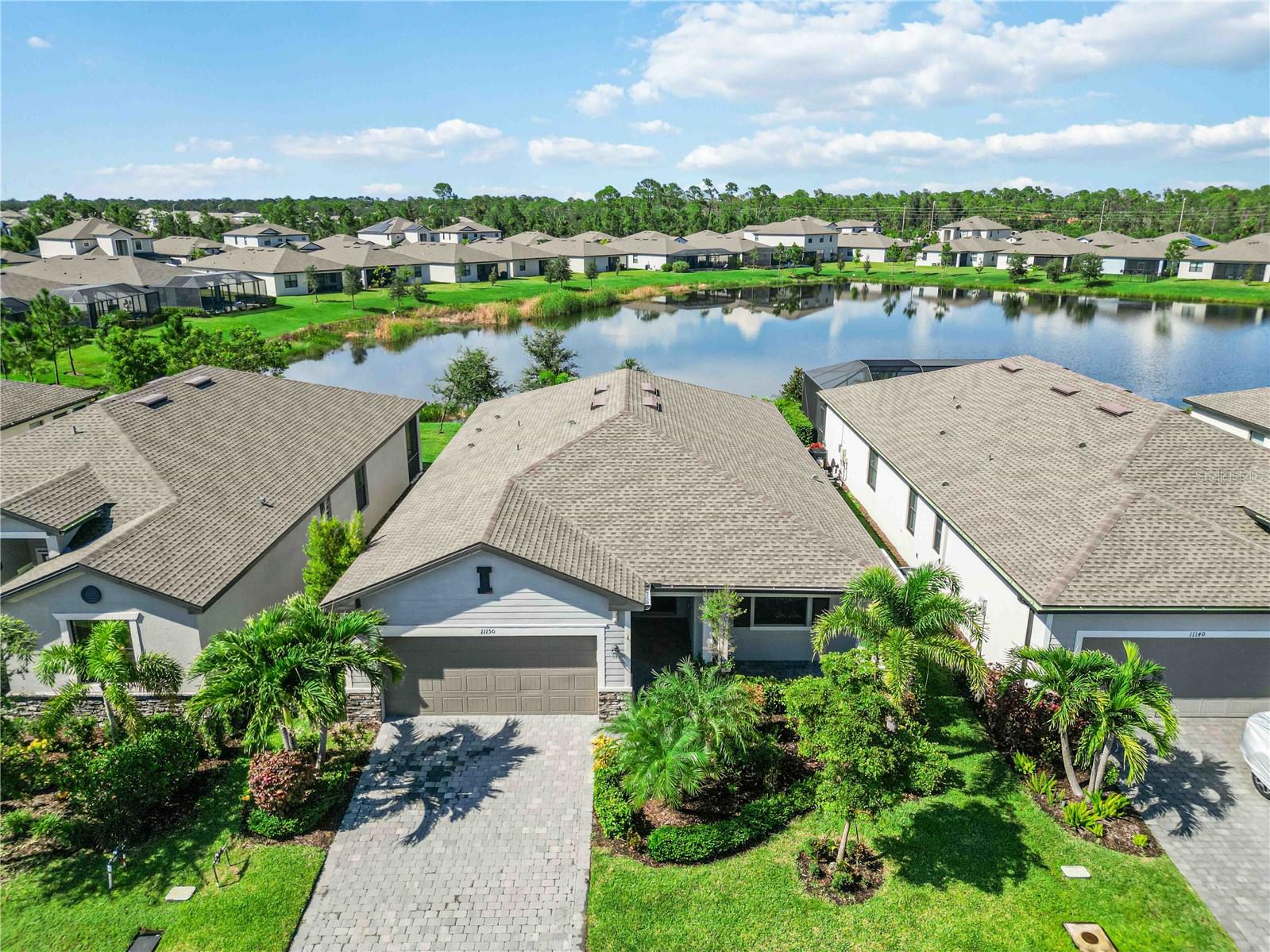 This 3-bedroom, 3-bath, 2-car garage Venice Model offers the perfect blend of comfort, style, and convenience. Set within a low-HOA, gated neighborhood that is part of the sought-after Wellen Park master-planned community, this home delivers a relaxed Florida lifestyle without the high fees.
Inside, the open-concept layout is bright and inviting, with high ceilings, abundant natural light, and tasteful finishes throughout. The kitchen is a true centerpiece, featuring stainless steel appliances, modern cabinetry, a large center island, and plenty of counter space — perfect for both everyday living and entertaining.
The spacious primary suite includes a walk-in closet and a luxurious en-suite bath with dual vanities and a walk-in shower. Two additional bedrooms each enjoy their own full bathroom, offering comfort and privacy for guests or family.
Step outside to the covered lanai, where you can enjoy peaceful mornings or relaxing evenings in a quiet, secure setting.
Located in Wellen Park, ( which is currently rated # 6 NATIONALLY and climbing per RCLO's 2024 Years End Report you’ll have easy access to shopping, dining, golf, walking trails, and the exciting Downtown Wellen district — plus just a short drive to Gulf beaches and cultural attractions.
This is Florida living made simple: a modern home, low-maintenance community, and a location that’s hard to beat