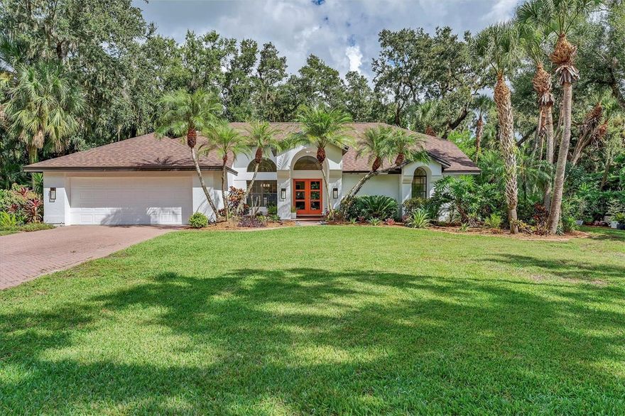 ENCHANTMENT IN MISTY CREEK – the opportunity for a “one in a million” property like this rarely comes on the market. Offering a lifestyle like that of a high-end resort and spa. Designed by a master gardener with ease of maintenance in mind, the backyard looks like something straight out of Selby Gardens. Nature lovers will enjoy seeing owls, deer, hawks, fish, and other wildlife daily. Orchids and a wide variety of flora, including some rare and collectible plants abound. The waterfall and pond can be observed and heard from vantage points throughout the home. Multiple “secret garden” spaces throughout the property give you the opportunity to reflect and simply enjoy nature. The outdoor lighting system is professionally designed to enhance the beauty of the property, especially the deck area in back that turns into your own private oasis. You're going to love the casual, contemporary design with mid-century elements. This 3-bedroom, 2-bath oversized 2-car garage pool home is nestled in The Preserve at Misty Creek. Set on .63 of an acre and tucked away within a CUL-DE-SAC at the coveted north end of Misty Creek, this home is, arguably, one of the best lots in all of Misty Creek and is in the X FLOOD ZONE, NO FLOOD INSURANCE REQUIRED. The main living areas and primary suite are light & bright. Pocket sliding glass doors open to the screened lanai & paver pool deck. There’s a covered seating area on the lanai that essentially brings the outdoors in and extends your living space. Seller improvements include a NEW ROOF (2021), NEW POOL CAGE (2018), POOL RESURFACING (2018), POOL HEATER (2018), NEW A/C (2017), NEW KITCHEN REMODEL, NEW BATHROOMS REMODEL, NEW APPLIANCES, NEW FRONT DOOR (2023), NEW OUTDOOR LIGHTING, NEW SLIDING GLASS DOORS & 9 NEW WINDOWS slated for installation in November 2025. High ceilings, crown molding, ceramic tile throughout the main living areas, and a laundry room that doubles as a butler’s pantry with additional cabinetry, sink, storage and countertop space all contribute to making this home not only beautiful, but functional. The Preserve at Misty Creek is a gated community of 302 single-family homes. It's an exciting time in Misty Creek as the Misty Creek Country Club is currently closed for renovations and the new improved club is expected to open in November 2025! Perks of Misty Creek – NO MANDATORY GOLF MEMBERSHIP, a well-run responsive HOA with LOW HOA FEES, “A” RATED SCHOOL DISTRICT with school bus stops within the community, a security gate, the feeling of being in the country with close proximity to everything you need, an established community with many longtime residents, the wildlife, nature & abundance of 100+ year old oak trees just to name a few. Misty Creek offers convenient access to shopping, beaches, parks, dining, I75, golfing, boating, fishing & more! Don’t miss your opportunity to have your own personal sanctuary in this beautiful community!!! SCHEDULE A SHOWING TODAY!!!
