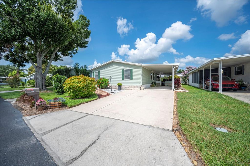 Photo of 6335 Grove Pointe Drive SE, Winter Haven, FL 33884 (MLS # P4935467)