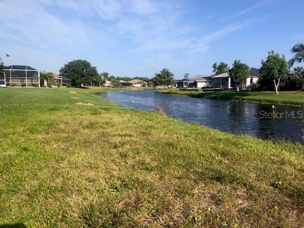Photo of 174 Long Meadow Lane, Rotonda West, FL 33947 (MLS # D6123868)