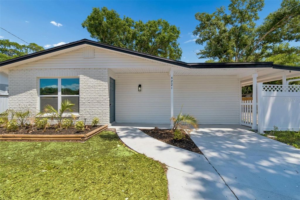 Photo of 4221 Empire Place, Tampa, FL 33610 (MLS # TB8504246)