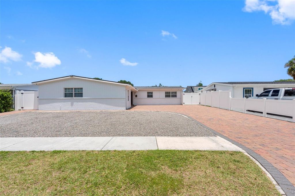 Photo of 6033 Ambassador Drive, Tampa, FL 33615 (MLS # TB8509633)