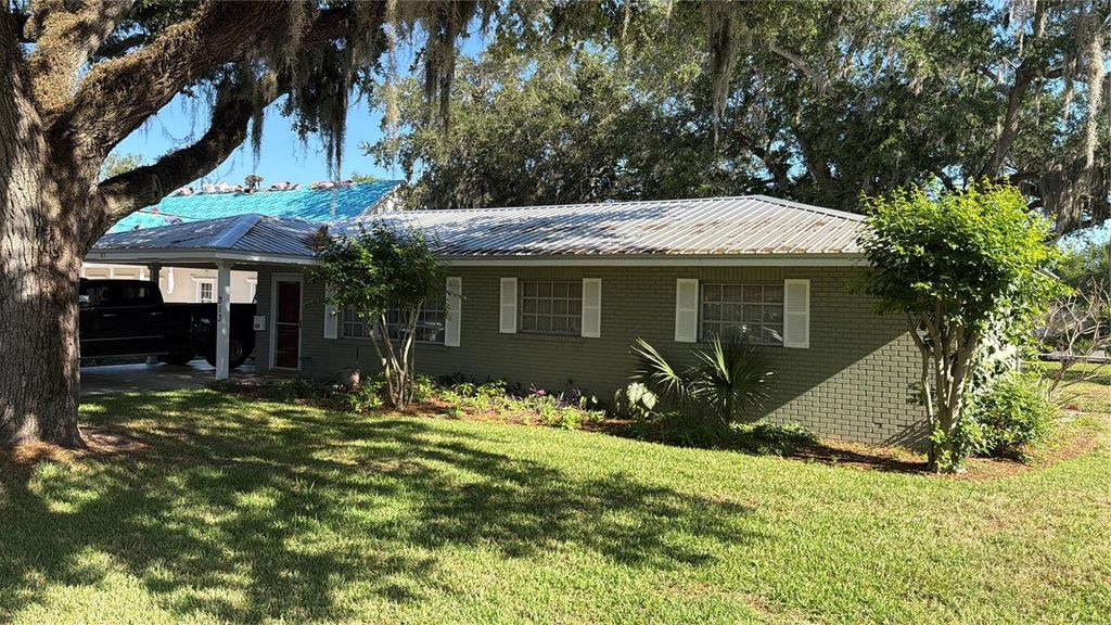 Photo of 313 W Highland Drive, Lakeland, FL 33813 (MLS # L4961206)