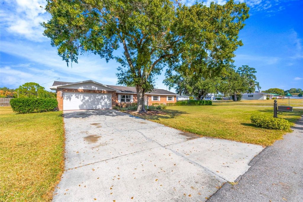 Photo of 424 Forest Glen Avenue, Lakeland, FL 33813 (MLS # TB8450297)