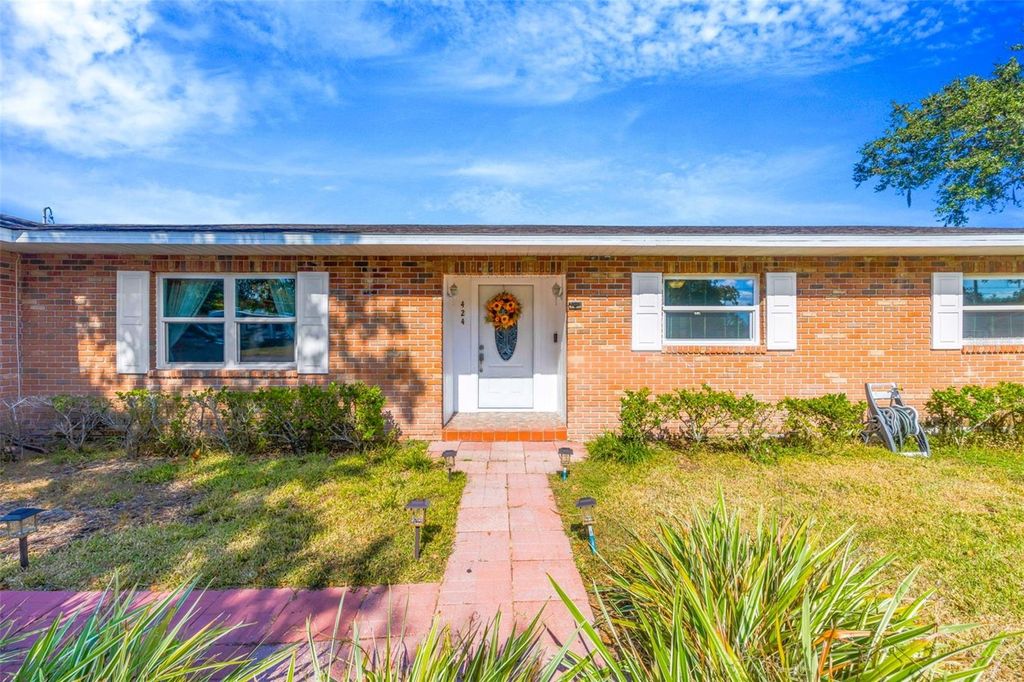 Photo of 424 Forest Glen Avenue, Lakeland, FL 33813 (MLS # TB8450297)