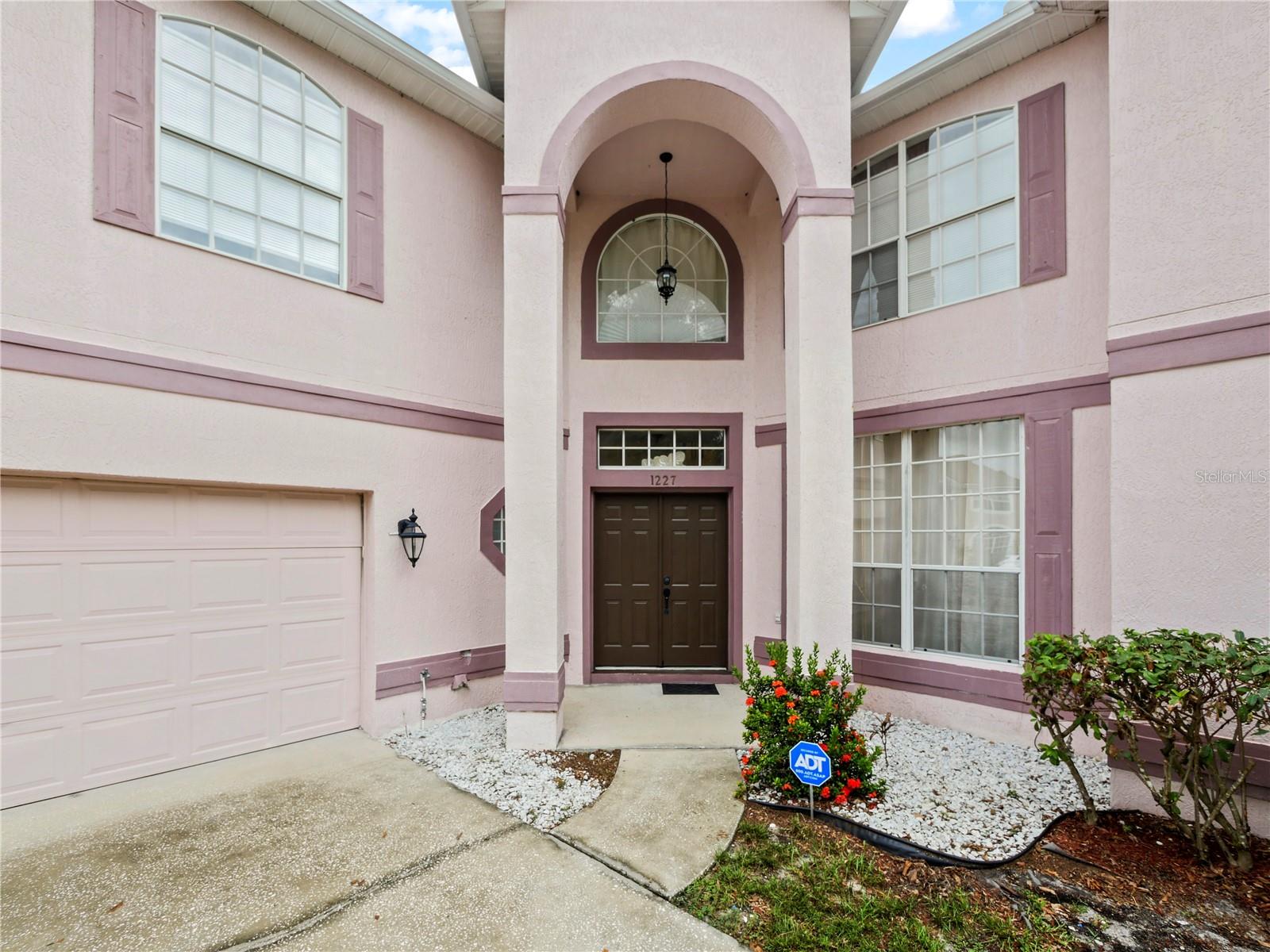 Pack your bags and move right in to this spacious five-bedroom, three-bathroom home perfectly designed for comfortable living and entertaining. The primary bedroom has a sitting area. A downstairs bedroom offers ideal privacy for guests or extended family stay. Step into the grand foyer and immediately feel the openness of the layout, complete with a formal living room and formal dining area ready to host gatherings. The kitchen awaits your personal touch to make it truly your own. This home is ideal for gatherings around the kitchen for special occasions and holidays. Enjoy peace of mind with a roof replaced(2017) and new dual air conditioners (2022). The expansive floor plan continues outdoors with a fenced backyard, providing room for play, pets, or relaxation. A three-car garage adds convenience and plenty of storage throughout the home. The home is conveniently located near major roads, shopping, and dining.
