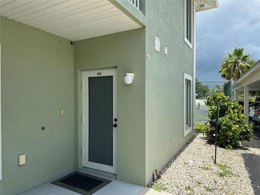 Photo of 8050 Memory Lane #101, Rotonda West, FL 33947 (MLS # D6144042)