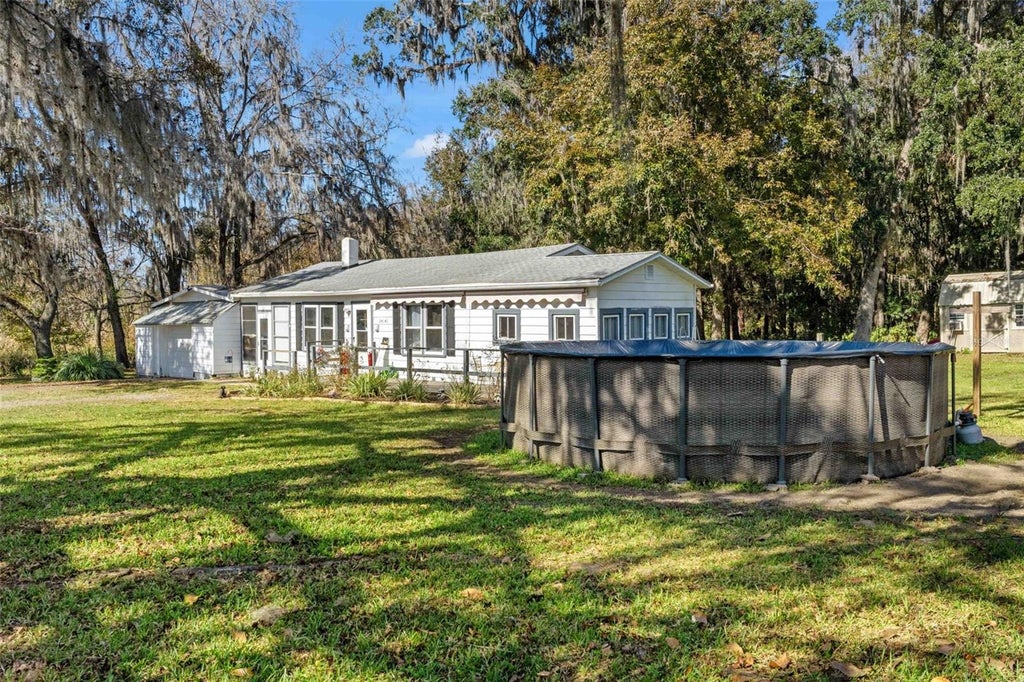 Photo of 24141 Mondon Hill Road, Brooksville, FL 34601 (MLS # W7890805)