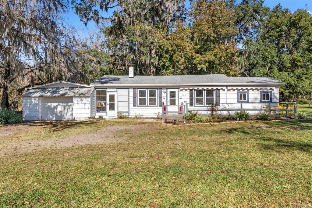 Photo of 24141 Mondon Hill Road, Brooksville, FL 34601 (MLS # W7890805)