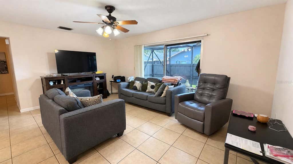 Photo of 3914 NW Cinnamon Tree Circle, Jensen Beach, FL 34957 (MLS # O6436163)