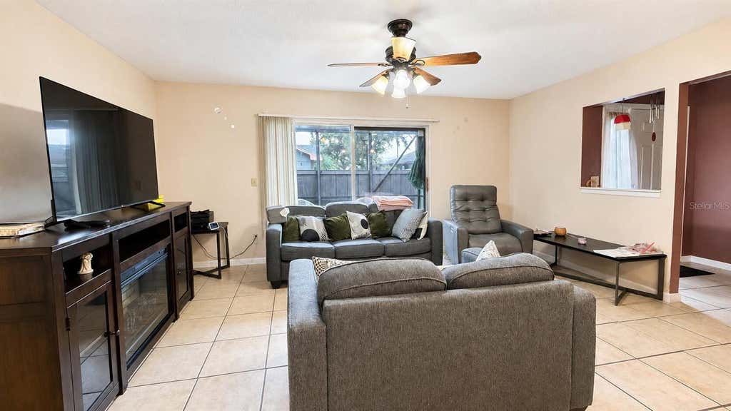 Photo of 3914 NW Cinnamon Tree Circle, Jensen Beach, FL 34957 (MLS # O6436163)