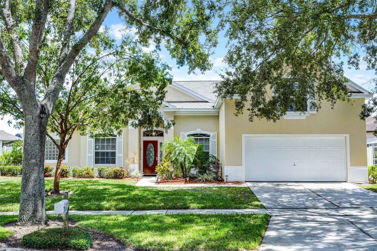 One or more photo(s) has been virtually staged. Welcome to your Florida escape! This beautifully maintained 5-bedroom, 4-bathroom POOL home offers resort-style living with one of the largest pools in the neighborhood, complete with a screened enclosure, heated spa, and resurfaced finish. A fully fenced yard and natural landscaping create a private retreat perfect for entertaining or relaxing.
This home has been thoughtfully updated with a new roof (under 5 years), HVAC (3–5 years), new hot water heater, updated pool equipment, and updated ceiling fans throughout. Even the oversized garage has been finished with epoxy floors and built-in storage—proof that every detail has been cared for.
Inside, the layout is designed for both comfort and flexibility. Just like all spaces in the home, the kitchen is impressively large, featuring a walk-in pantry, ample cabinet space, and stainless steel appliances including a Bosch dishwasher and newer microwave. From the sink, you’ll enjoy views of both the family room and pool area.
The primary suite is a true retreat with sliding doors to the pool, dual walk-in closets, and a luxurious bath featuring split vanities, a garden tub, and a separate shower. Upstairs, a spacious 5th bedroom/flex space with vaulted ceilings and its own bathroom provides endless options—ideal for a guest suite, media room, playroom, or hobby space.
The landscaping has been refreshed with Jamaican Cherry tree, gardenias, banana trees, palms, and new shrubs, while gravel on the side yard improves drainage and keeps the exterior low-maintenance.
Community amenities are just steps away —you can see the basketball courts, tennis courts, and playground from the driveway. Plus, you’ll love the convenience of being less than 30 minutes to Magic Kingdom, under 2 miles to Publix, and surrounded by endless shopping, dining, and golf options.
Whether you’re looking for a primary residence, vacation home, or rental investment, 327 McFee offers the perfect combination of space, upgrades, and location.