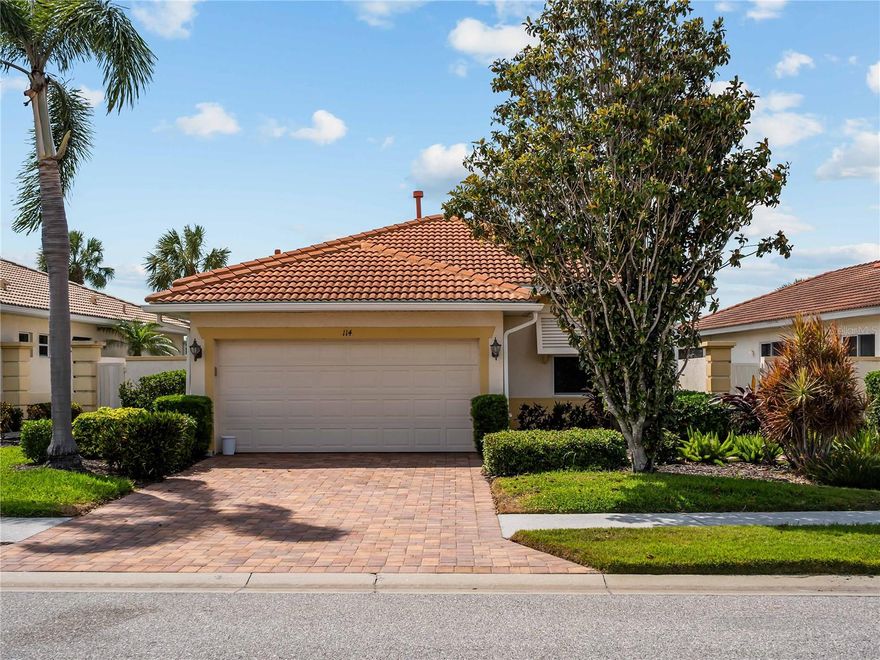 Welcome to this stunning waterfront home in the sought-after Venetian Golf & River Club. Perfectly situated at the end of a quiet cul-de-sac, this beautifully upgraded 2-bedroom, 2-bath residence with a dedicated office, Florida room, and lanai offers both elegance and comfort in a serene setting.
Step inside to discover high ceilings, crown molding,  and tray ceilings with LED lighting that elevate the home’s sophisticated design. Four sliding glass doors flood the space with natural Florida sunshine, seamlessly blending indoor and outdoor living. Prefer a softer ambiance? Simply lower the automatic shade or umbrella and enjoy tranquil pond views with a charming fountain backdrop.
This home is loaded with thoughtful upgrades, including double pane windows, full guttering, an Aqua-Soft water softener with reverse osmosis system, and a newer AC unit for peace of mind. Evenings are best spent on the lanai with ambient lighting, creating the perfect setting to unwind or entertain.
The modern kitchen is designed to impress, featuring granite countertops, soft-close cabinetry, two pantries, and upgraded stainless steel appliances. The breakfast bar is ideal for casual dining—perfect for enjoying a charcuterie board while watching the game. The home also includes surround sound and a built-in entertainment center for an enhanced living experience.
Additional highlights include a well-appointed laundry room with wood cabinetry and a newer washer and dryer, plus a spacious two-car garage with epoxy flooring, overhead storage, and bike racks.
Located just minutes from I-75, beaches, downtown Venice Island, shopping, dining, and medical facilities, convenience is at your doorstep.
Residents of Venetian Golf & River Club enjoy resort-style amenities, including a pool and lap pool, Har-Tru tennis courts, tiki bar with food service, and a luxurious clubhouse offering fine dining, fitness facilities, yoga classes, and social activities. Golf enthusiasts can take advantage of the 18-hole championship course and private clubhouse (membership optional).
With miles of scenic walking trails and a vibrant social calendar featuring live music, events, and recreational activities, this gated, 24-hour secured community offers an unparalleled Florida lifestyle.
Come experience why so many are drawn to this exceptional neighborhood—your own slice of paradise awaits.