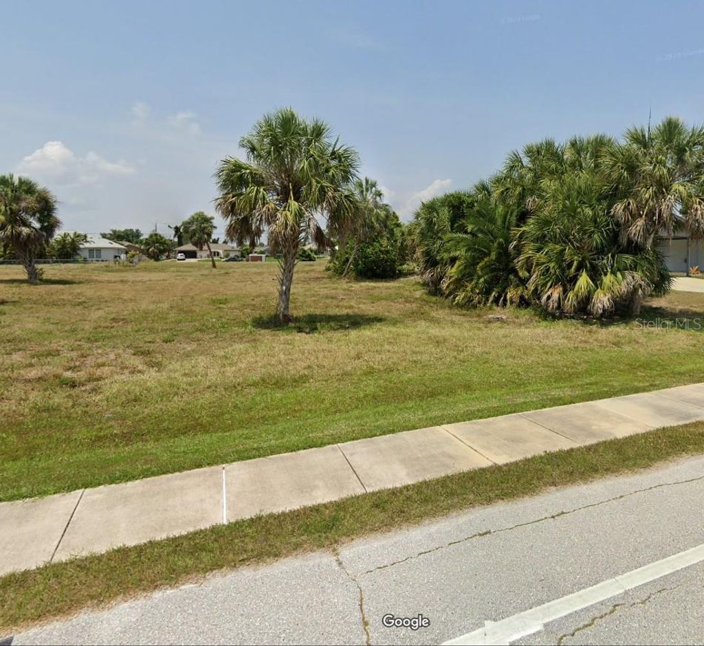 Photo of 226 Rotonda Boulevard W, Rotonda West, FL 33947 (MLS # A4657106)