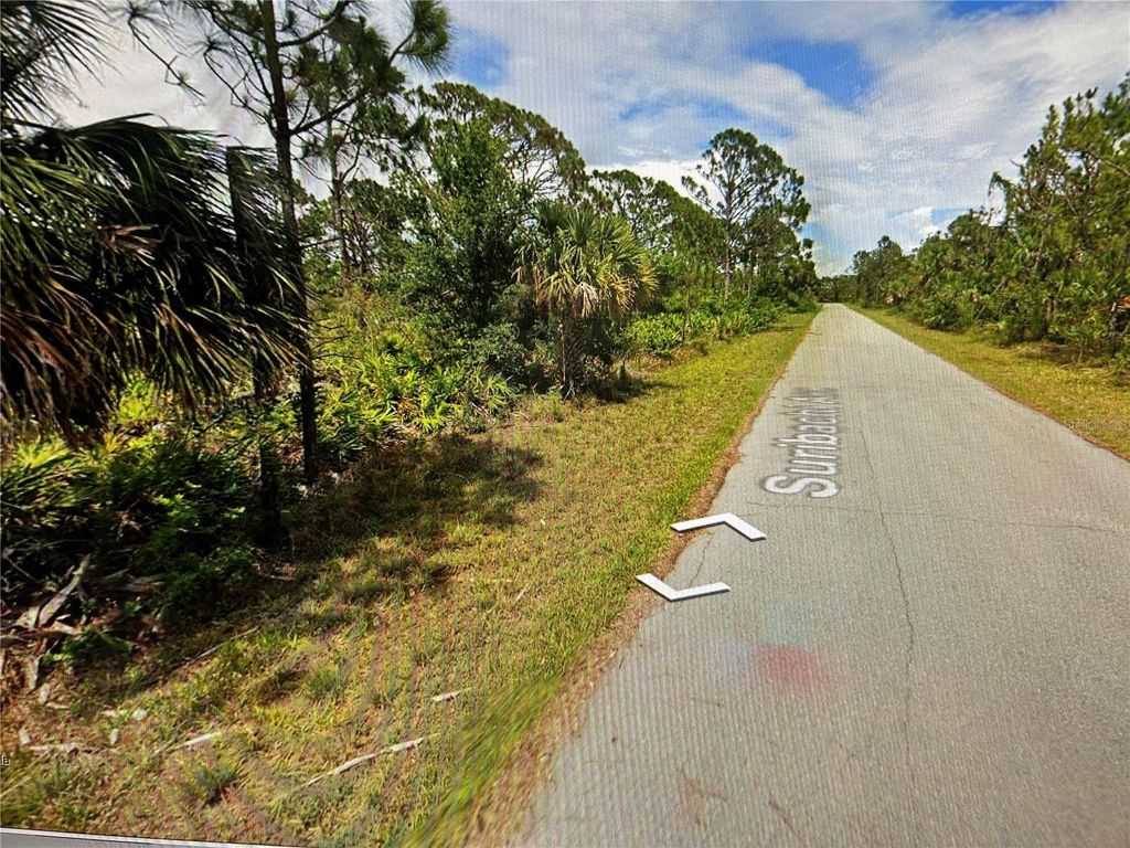 Photo of 13550 Suribachi Avenue, Port Charlotte, FL 33953 (MLS # TB8475561)