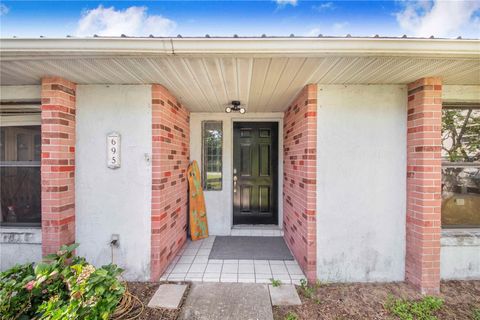 Photo of 695 N Todhunter Way, Lake Alfred, FL 33850 (MLS # P4935790)