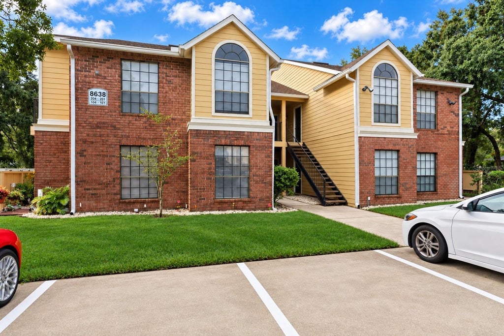 Photo of 8638 Fancy Finch Drive #101, Tampa, FL 33614 (MLS # TB8550625)