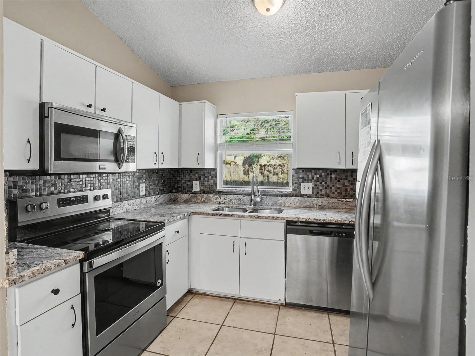 1626 WOODSTONE DRIVE
