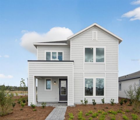 Photo of 3206 Voyager Avenue, Saint Cloud, FL 34771 (MLS # TB8475438)