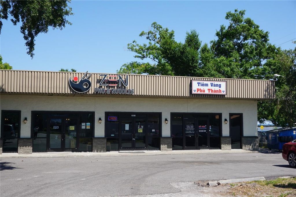 Photo of 3021 W Waters Avenue, Tampa, FL 33614 (MLS # TB8376207)