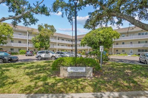 Photo of 2440 World Parkway Boulevard #52, Clearwater, FL 33763 (MLS # TB8432599)