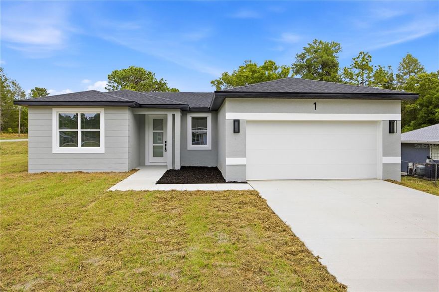 Welcome to this stunning, newly built residence, perfectly positioned on a coveted oversized corner lot in a quiet cul-de-sac in the heart of Silver Springs Shores. Blending timeless design with modern elegance, this home is designed to impress from the moment you arrive. Step through the covered foyer into a bright, open-concept floorplan showcasing luxury vinyl flooring throughout. Formal Dining area boasts striking tray ceiling, upgraded lighting which sets the stage for memorable meals. The chef’s island kitchen is a true showstopper—featuring stainless steel appliances, gleaming quartz countertops, and a spacious walk-in pantry. The primary suite offers a private retreat, highlighted by a custom barn door leading to a spa-inspired bathroom. Indulge in dual vanities, an oversized walk-in shower with classic subway tile, and expansive walk-in closets. Designed for entertaining, the open patio provides the perfect backdrop for weekend barbecues or quiet dinners under the stars. Located in central Silver Springs Shores, you’ll be just minutes from shopping, dining, and medical facilities—making this a rare opportunity to own a brand-new home in one of the area’s most desirable locations.