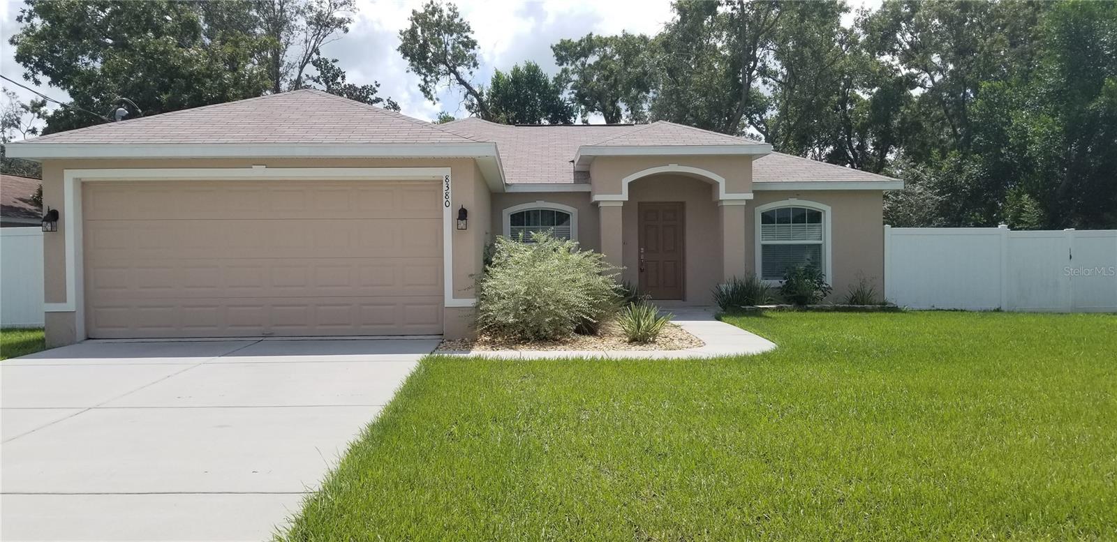 Beautiful 2016 built Palmwood home, the Santa Lucia model. Located on a 1/3 of an acre, this 3/2/2 home has all of the privacy you are looking for. Enter the front door to an open floor plan featuring the dining area, living room with cathedral ceilings and a beautiful kitchen with a breakfast bar, stainless steel appliances and a large pantry. Utility room with a washer and dryer (for tenant convenience only). Wood looking vinyl throughout except the bedrooms which have carpet. Step outside on the covered lanai and enjoy the great outdoors in your private backyard that also has a great set-up for chairs and a firepit that is already in place. Including other features such as ceiling fans, soft close cabinets in the kitchen, granite countertops, and window treatments.