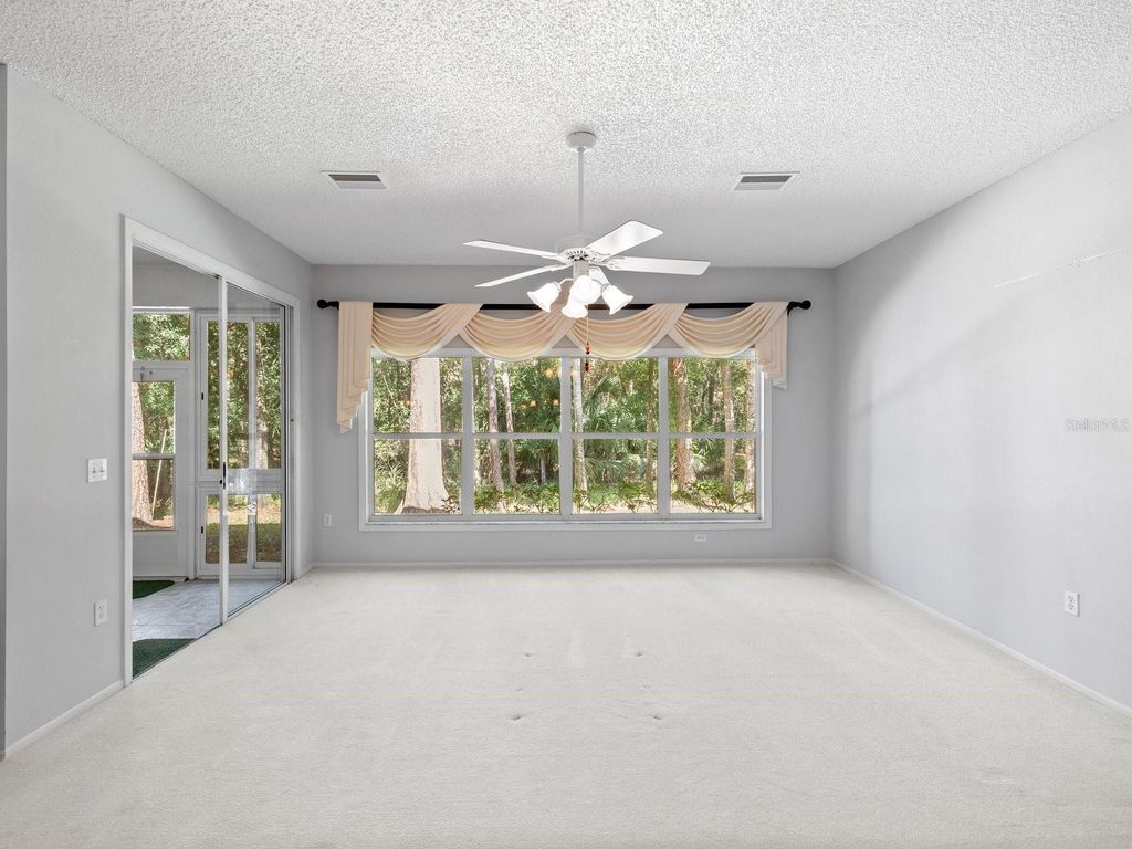 Photo of 3504 Tealwood Circle, Palm Harbor, FL 34685 (MLS # V4945379)