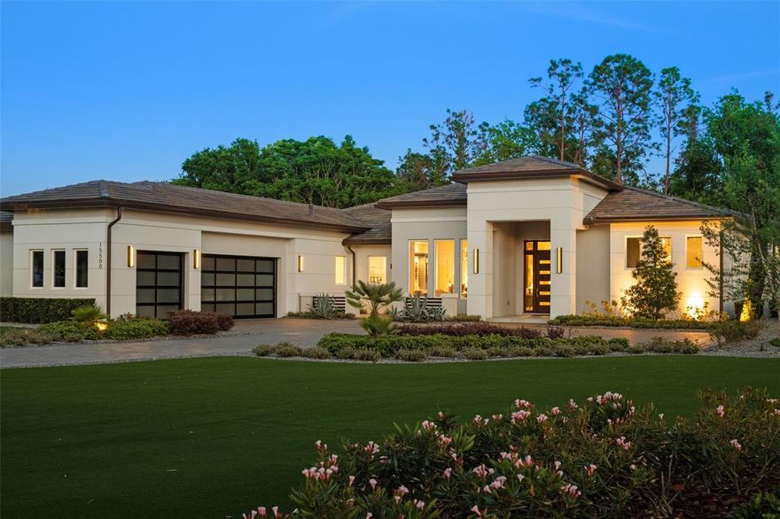 FULLY DECORATED/FURNISHED MODEL LEASEBACK OPPORTUNITY-Experience the pinnacle of modern luxury living in this stunning Bel-Air Model Home, showcasing transitional architecture with sleek contemporary elements. Encompassing 5 bedrooms, 5 bathrooms, and a 3-car garage, this 4,518 sq. ft. residence offers a seamless blend of style, comfort, and advanced technology.

Step through the dramatic 10-foot entry door into a thoughtfully designed interior with 12-foot ceilings, engineered hardwood flooring, and designer finishes throughout. The expansive great room features a three-way glass fireplace and 10-foot pocketing sliding doors that open to the lanai, creating a fluid indoor-outdoor living experience. The gourmet kitchen is a culinary masterpiece, equipped with a full Wolf and Sub-Zero appliance suite, quartz countertops, a pot filler, and custom lighting.

The luxurious primary suite impresses with a seating area, wet coffee bar, showcase closets with glass doors and LED lighting, and a spa-like bath with a freestanding tub and programmable retractable shade. Flexible living spaces include a front bedroom/office with a custom wine built-in, a guest suite with a private porch and kitchenette, and a media/flex room with pool bath access.

Designed for effortless entertaining, the outdoor living space features a modern linear fireplace, a summer kitchen with a waterfall island, and a fully automated heated pool and spa. Additional highlights include a climate-controlled garage with a 10,000-pound car lift, synthetic turf landscaping, a sealed paver driveway, and a $150,000 Crestron smart home automation system controlling lighting, audio, video, security, and climate.

Sold fully furnished with a $125,000 designer package, this turnkey residence offers an unparalleled lifestyle of sophistication, comfort, and cutting-edge innovation. Builder will leaseback the home from the Buyer for a period of one year from the date of closing compensating the Buyer $10,000.00/month. Buyer will be responsible for the annual property taxes during the leaseback period. Seller will pay the club sports membership fees, HOA fees, pool and lawncare, utilities and insurance on the home during the leaseback period.

Located within the gates of Bella Collina, residents enjoy a vibrant year-round calendar of culinary and social events, offering endless opportunities for connection and enjoyment. Golf enthusiasts can tee off on the renowned Nick Faldo-designed championship course, while others can relax on the scenic restaurant terraces. Bella Collina’s world-class amenities include Har-Tru tennis courts, pickleball courts, a luxurious spa, an expansive outdoor pool complex, and a cutting-edge fitness center with complimentary fitness classes. Contact us today to schedule a personal tour of this home and the community. The $40,000 Sports Membership Deposit is Deferred by the Seller.