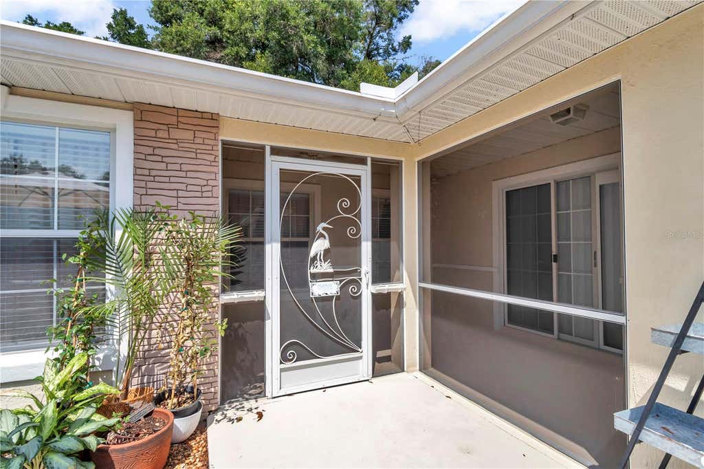 Photo of 7229 SW 115th Place, Ocala, FL 34476 (MLS # OM728149)