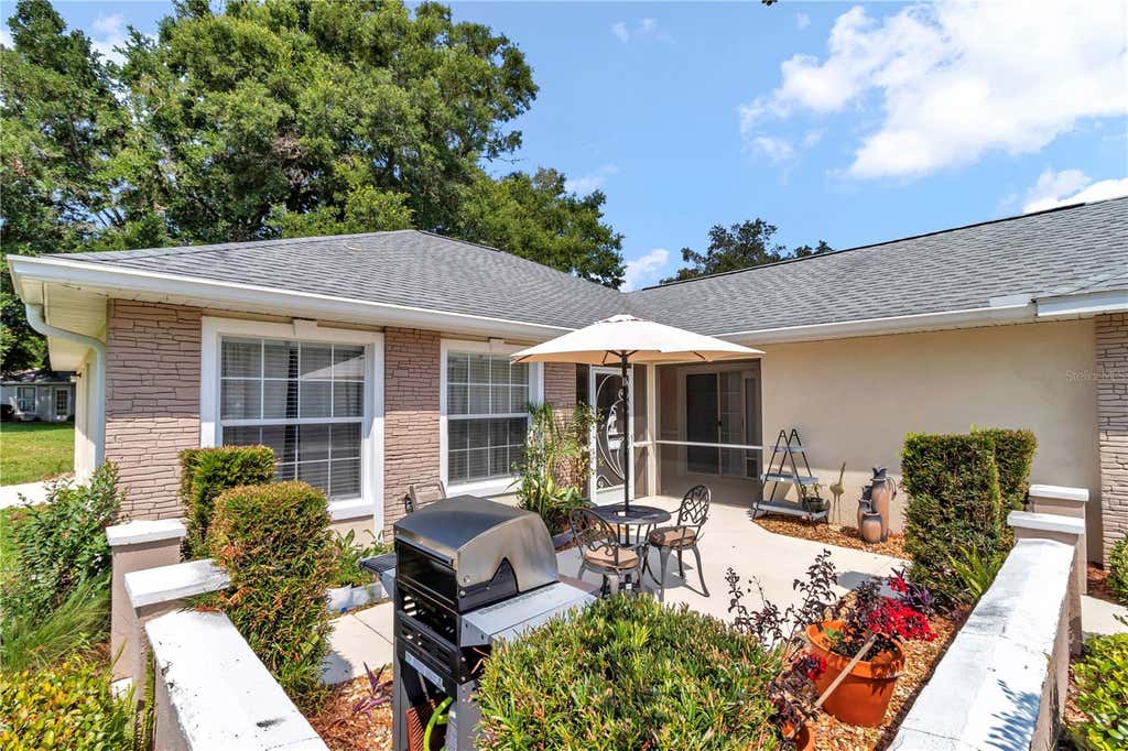 Photo of 7229 SW 115th Place, Ocala, FL 34476 (MLS # OM728149)