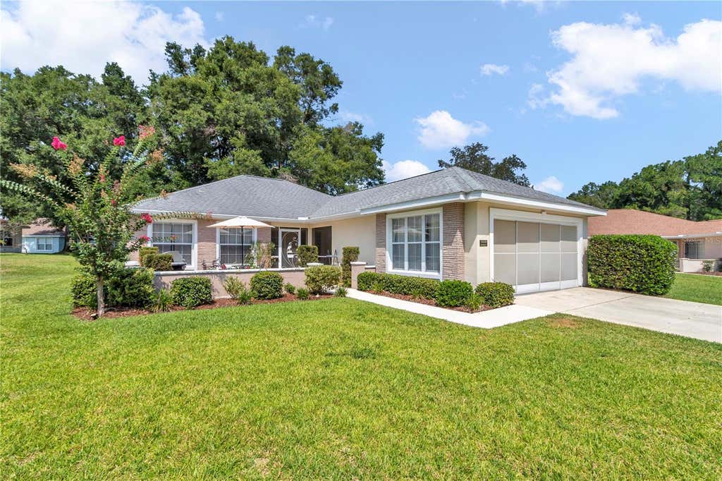 Photo of 7229 SW 115th Place, Ocala, FL 34476 (MLS # OM728149)