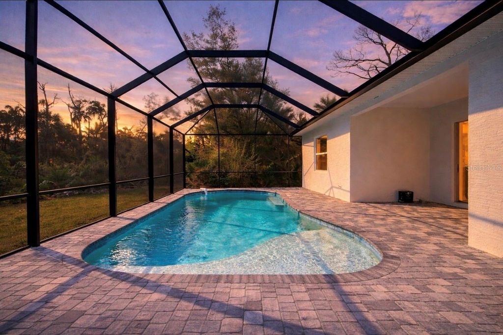 Photo of 107 Swan Drive, Rotonda West, FL 33947 (MLS # D6147069)