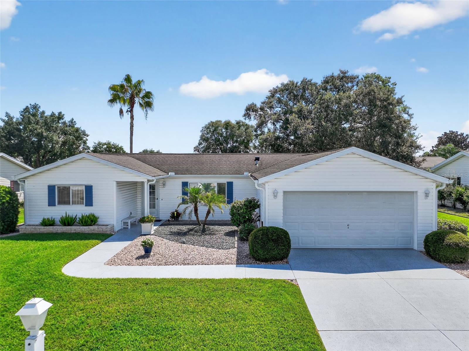 WELCOME TO SPRUCE CREEK SOUTH!! A TRULY GATED COMMUNITY. THIS BEAUTIFULLY LANDSCAPED WELL MAINTAINED 3BR, 2BA HOME LOCATED NEAR THE VILLAGES, SHOPPING, RESTAURANTS AND MEDICAL FACILITIES. 12 MINUTES TO SPANISH SPRINGS TOWN SQUARE. NOTICE THE LUXURY VINYL PLANK FLOORING IN LIVING, DINING, KITCHEN AND LAUNDRY ROOM (INSIDE LAUNDRY). BEDROOMS ARE CARPETED. SCREENED ENCLOSED 12X20 LANAI. 20X22 GARAGE IS CLEAN AND HAS PAINTED FLOOR. AC 2011. ROOF 2013. W/H 2023. SELLER IS OFFERING A 1-YEAR OLD REPUBLIC HOME PROTECTION PLAN. CALL TO SEE THIS BEAUTIFUL HOME TODAY.