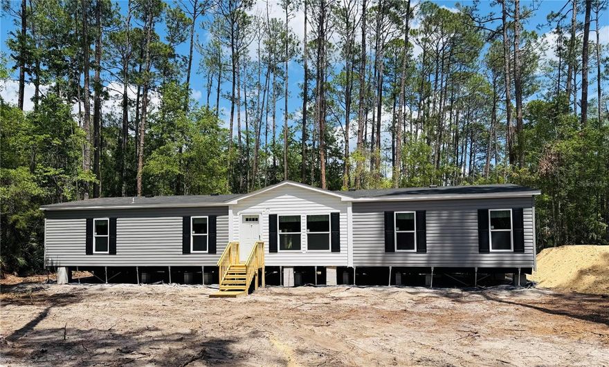 Brand NEW!!! Just Delivered. Discover the exceptional quality of this brand-new manufactured home for 2025! LOCATED ON A PRISTINE 1.14 ACRE LOT 4 BEDROOM 2 BATH Designed with an engineered foundation, this residence offers unparalleled support and stability. Featuring 4 spacious bedrooms and 2 modern bathrooms, this upgraded home showcases superior construction with 2x2 and 2x4 framing throughout. Nestled on a stunning lot, this property provides a serene retreat feel.The builder has maximized the land's potential, making it perfect for your horses, donkeys, or chickens!  This Lot is extremely PRIVATE. This home is built to last, featuring robust 3/4 inch tongue and groove OSB floor decking, the strongest ridge beams available, and a C-Channel cross beam for added support. The side walls are reinforced with 10-inch spaced studs, while the ceiling boasts R-21 insulation and strategically placed AC ducts for optimal comfort. Additional features include stud-mounted receptacle boxes and fully vented wrap-around eaves.  THIS IS THE BEST BRAND NEW HOME ON THE Market!!!