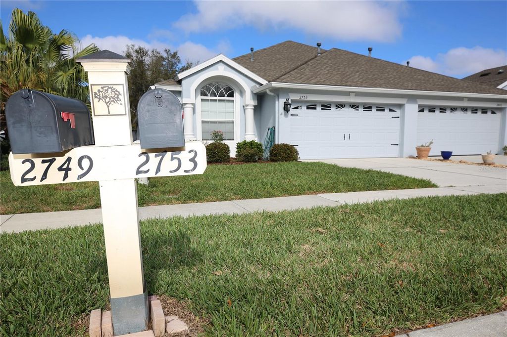 Photo of 2753 Tanglewylde Drive, Land O Lakes, FL 34638 (MLS # TB8486784)