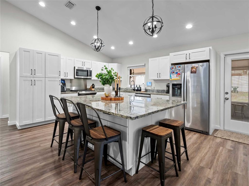 Photo of 12202 Meadow Lane, San Antonio, FL 33576 (MLS # TB8490389)