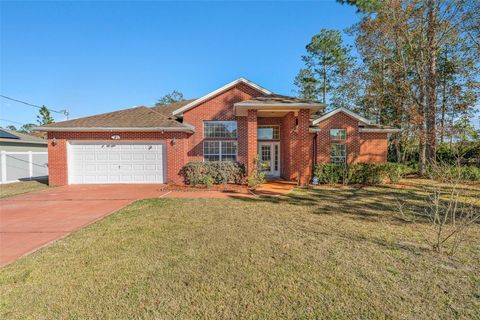 Photo of 19 Russkin Lane, Palm Coast, FL 32164 (MLS # FC315738)